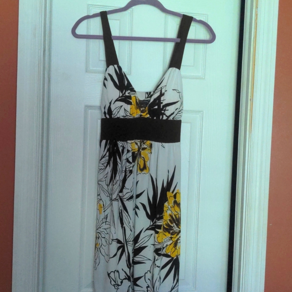 Sundress built in bra. Tie at waist in back.
